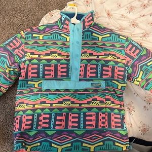 Men’s chubbie brand reversible half zip pullover.